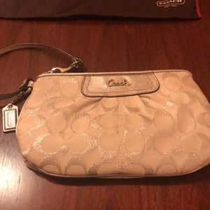 Coach Wristlet.  Great condition.  Silver.